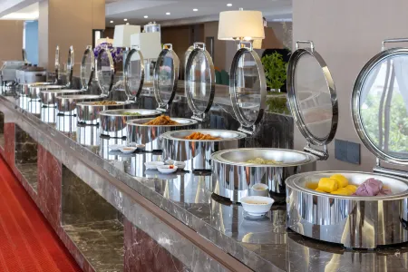 Kunming Mingyu Licheng Hotel (Shijicheng Dadu Branch) Отели рядом с достопримечательностью «Kunming University»