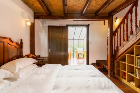 Puzhehei Manpin Huafang Inn Отели рядом с достопримечательностью «Fairy Cave»