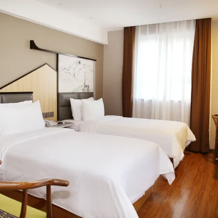 Joy Susiness Hotel (Korla Tuanjie North Road Peacock River)