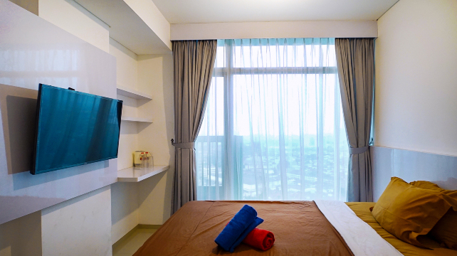 Ventura Room at TreePark City by Ruang Nyaman Hotels in Tangerang