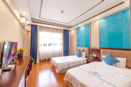 Jinghong Xinyi Boutique Hotel Отели рядом с достопримечательностью «Menghanman Tingfota Temple»