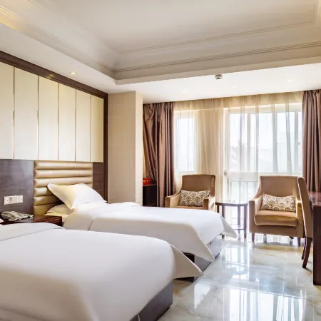 Jujia Fengshang Hotel (Xinzheng Sias International College) Отели рядом с достопримечательностью «Народная больница Синьцзяна»