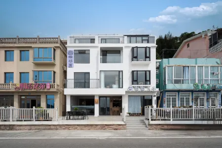 Floral Hotel·Dongtou Banxia villa (Wenzhou Jiucai Ao Beach Branch) Отели рядом с достопримечательностью «Wanghai Tower»