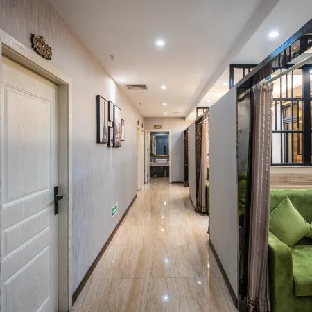 Quxian Garden Business Hotel (Qianrenli Wealth Center Branch)