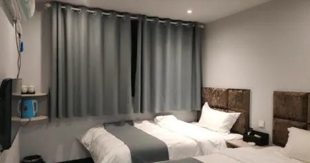 Bashan Grand Canyon Tujia Xinyue Inn Отели в г. Сюаньхань