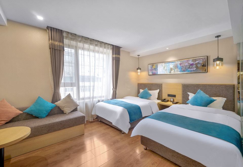 하얼빈 조이 부티크 호텔의 깔끔하고 현대적인 객실 인테리어