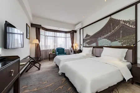 Guandu Hotel Отели рядом с достопримечательностью «Kunming Railway Vocational and Technical College (Yangfu Campus)»