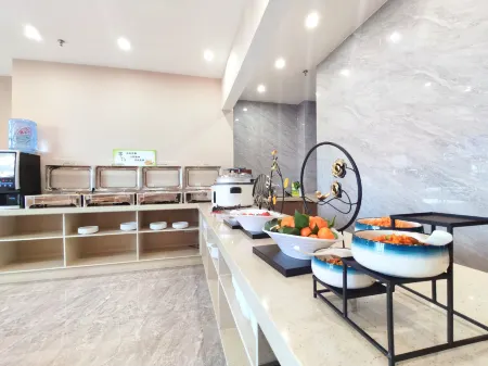 Shanhe Puyin Hotel (Xinyang East high speed railway station store) Отели рядом со станцией Xinyang East Railway Station