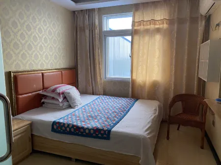 Hongtai Hotel Haicheng Отели рядом с достопримечательностью «Kuixing Building»