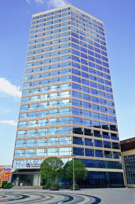 Xin Four Seasons Business Hotel (Siji Guizhou) Hotels near Chenguang Stationery (Qingzhen No.2 Middle School Shop)