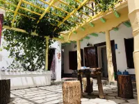 Pusu Homestay Hotel dekat Qingchengqiang Site