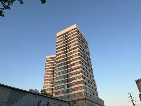 Shiguangli · loft Travel Secret Realm Designer Meisu (Yantai University Store) Отели рядом с достопримечательностью «Wenjing College Yantai University»