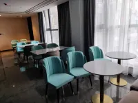Xana Hotelle Hotel (Xincai Shuiyun Tianjie) - فطور