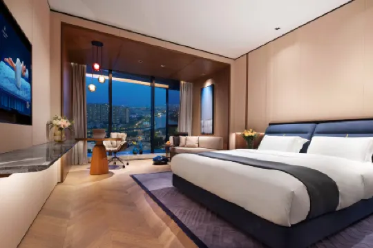 DeRUCCI Hotel (DongGuan BinJiang Stadium Station) Отели в г. Дунгуань