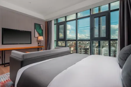 Pu'er Songkun Hotel (Yuecheng Shiguangli Shopping Park Shop)