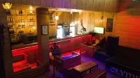 Olympus Hotel & Suites - bar
