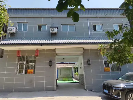 Shanchengxin Farmhouse Отели в г. Цзесю