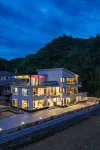 Floral Hotel·Tonglu Xiaqing Jinzhuwan Homestay Отели в г. Тунлу
