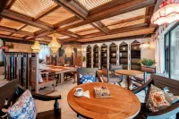 Floral Hotel · Jiangcheng Manju Homestay - Kitchens