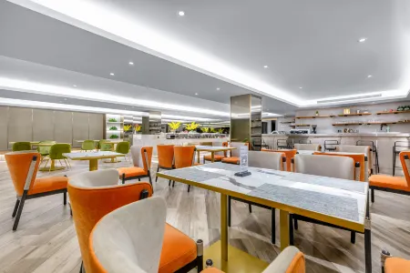 Tuke International Hotel (Wenzhou South Bus Terminal) Отели рядом с достопримечательностью «Wenzhou University (Chashan South Campus)»