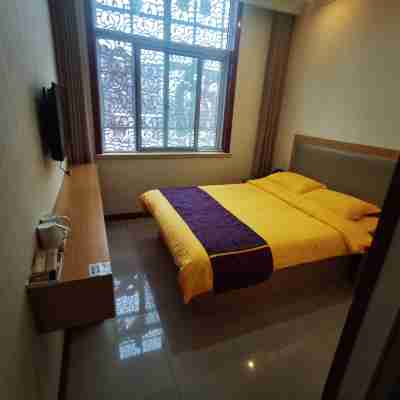 膠州坤罡商務賓館 Rooms