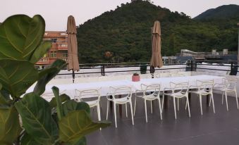 Shen zhen yang mei keng lin lan hai jing min su - Housity