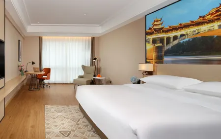 Vienna International Hotel (Chengdu Longquan Automobile City Aviation Academy Branch) Отели рядом с достопримечательностью «CPC Chengdu Longquanyi District Committee Party School»