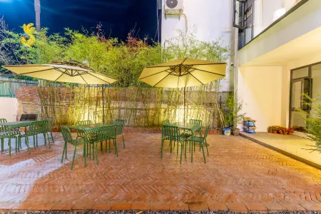 Moye Guesthouse Отели в г. Луньчуань