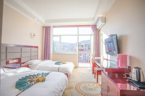Xinyue Hotel (Qicai Danxia)