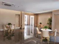 Kaixin.Xincheng Holiday Hotel - Morgenmad