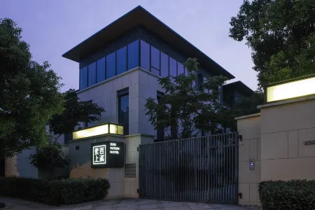 Xixi Susun Hotel Отели рядом с достопримечательностью «Zhejianggongye University (pingfengxiaoqu)»