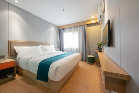 Aige Hotel (Shenzhen Bao'an Fanshen Subway Station) Отели рядом с достопримечательностью «Спортивный центр Боань-поле для плавания»