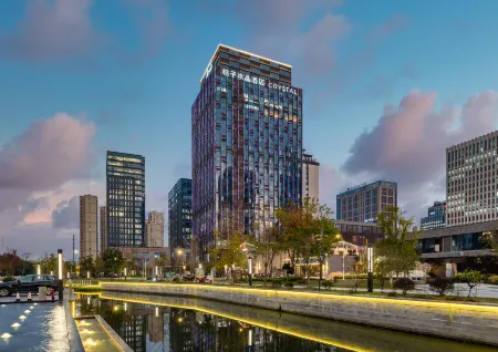 Crystal Orange Hotel Jiaxing Nanhu Отели рядом с достопримечательностью «Jiaxing University (North Campus)»