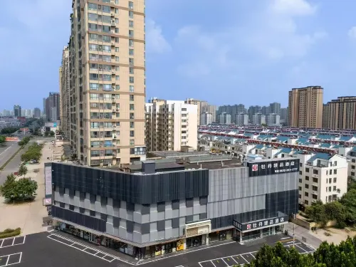 Mudan Zhenpin Hotel (Tengzhou True Love Mall)