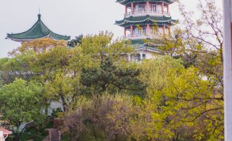Top Yunyin B&B (Qingdao Xiaoyushan Park University Road) - Housity