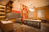 Xique CC Hotel (Xiayi Xuefeng East Road Bus Station)