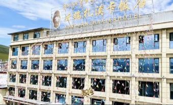 Shiqu Yunduan Zaxika Hotel