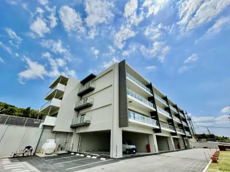 Coral Palace Onna by Sunset Avenue Отели рядом с достопримечательностью «National Institute of Information and Communications Technology Okinawa Electromagnetic Wave Technol»