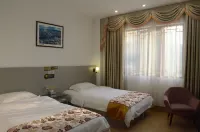 Four Seasons Flower Inn - Inns