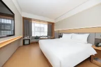 JI Hotel (Sishui Longcheng Times Building) Hôtels à : Sishui