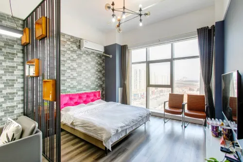 Qingxinyaju Homestay (Jincheng Red Star Macalline)