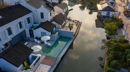 VILLAGE  STAY Отели рядом с достопримечательностью «Shanghai Puji Bridge»