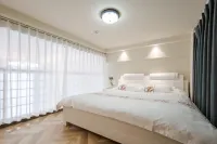 Huzhou Yiyunge Homestay (Nanxun Ancient Town Wuyue Plaza Branch) - Condos
