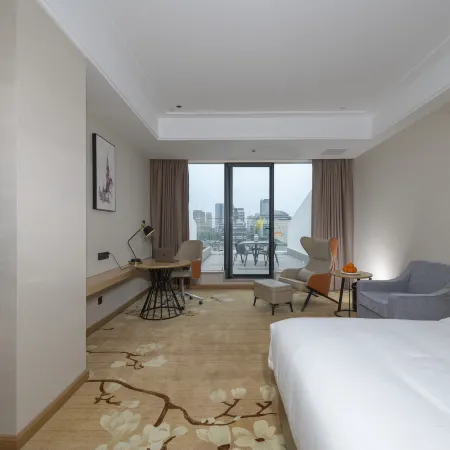 Vienna Hotel (Xinzheng Xuanyuan Lake Store) Отели рядом с достопримечательностью «Синхайская больница»