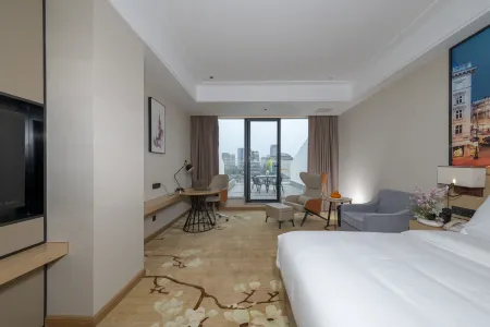 Vienna Hotel (Xinzheng Xuanyuan Lake Store) Отели рядом с достопримечательностью «Huang Di's Hometown»