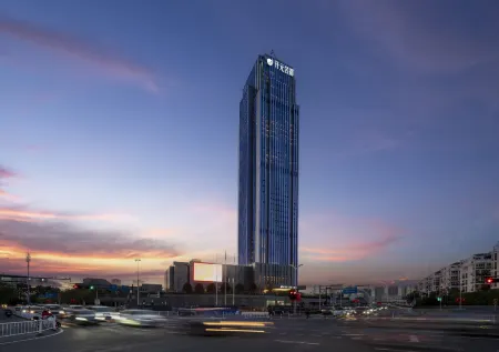 GRAND NEW CENTURY HOTEL SHENGZHOU Отели рядом с достопримечательностью «Huju Zoo»