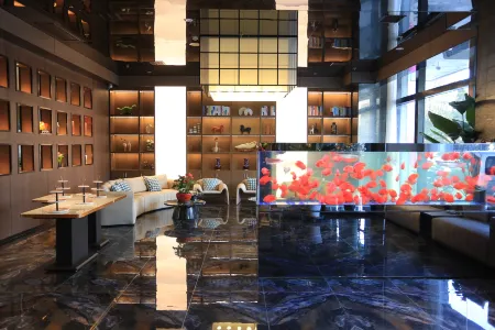 Zichen Nanting Hotel Отели в г. Тунчуань