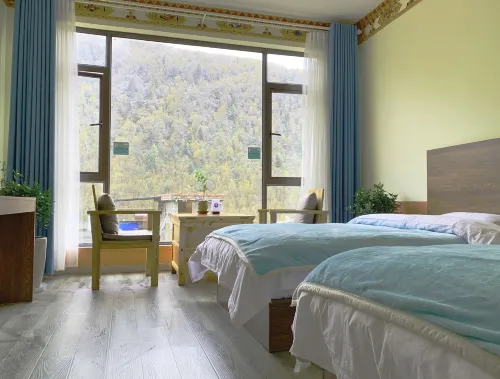 Four Sisters Mountain Knapsack International Hostel Hotels in Xiaojin