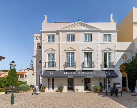 Old Village & Prestige Отели рядом с достопримечательностью «Praia da Quarteira»