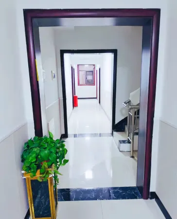 Zhoukou Kaixinyuan Hotel (Baicheng Railway Station)